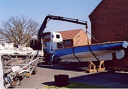 We arranged a truck mounted crane to lift the boat on to 'chocks' for some winter maintenance.