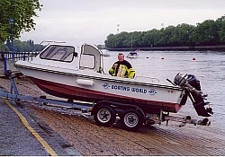 The proud new owner taking delivery directly into the Thames at Putney embankment, London.